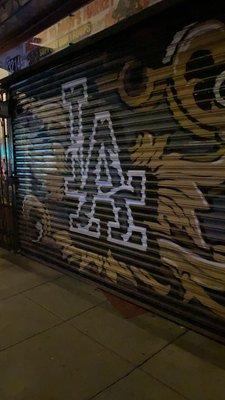 View of store front when the market is closed for the night. Market is open 11am - 6pm Mon - Fri, 12pm - 4pm Sat - Sun