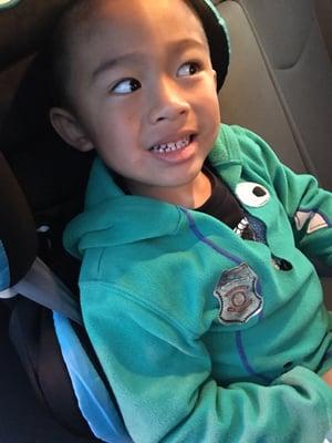 He gives him a sticker. There's that awkward Marleau smile.