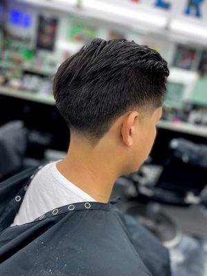 Medium skin taper Haircut by Almar "ROC"