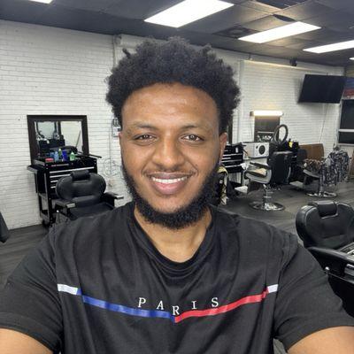 The owner of crown barbershop