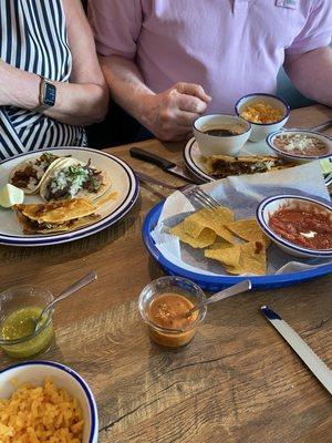 Street tacos and birria with cheese trio tacos