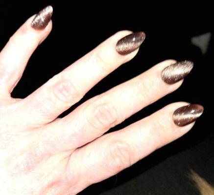 Medium length almond shaped gel extensions with cats-eye gel polish