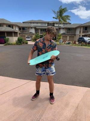 Cradling his brand new Carver board