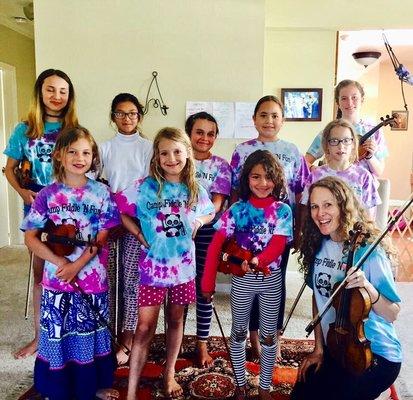 Campers showing off the t-shirts they tie-dyed themselves!