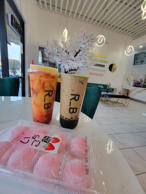Mangonada with crystal boba, Vietnamese coffe with brown sugar boba, and strawberry mochi.