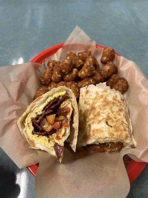 Bacon breakfast burrito with tots