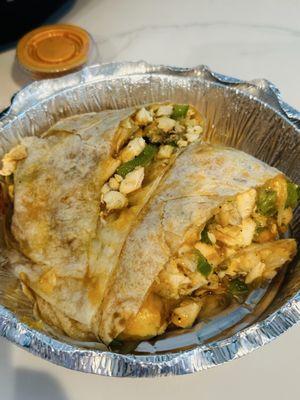 Chicken Quesadilla includes onions & peppers, chipotle sauce or white sauce. $10.99 very tasty and enough for two!