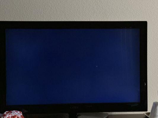 Tv had a blu screen most times when I tried to change channels and had a green spot on it like it was going out.