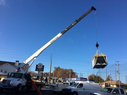 Lifting AC units onto roof of new Arbys in Blairsville Ga.