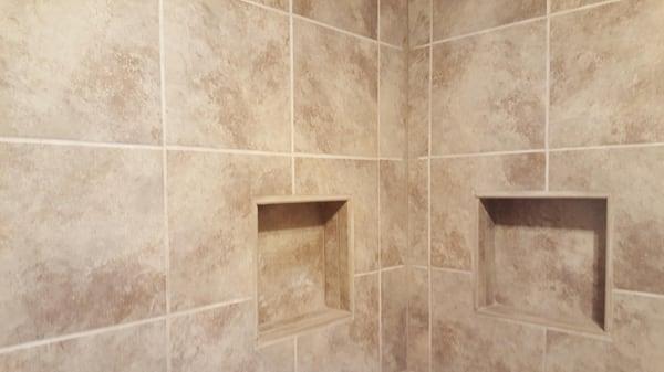 Picture of a recent bathroom tiling job we did. We installed tile on the floor and walls - 12 inch tile.