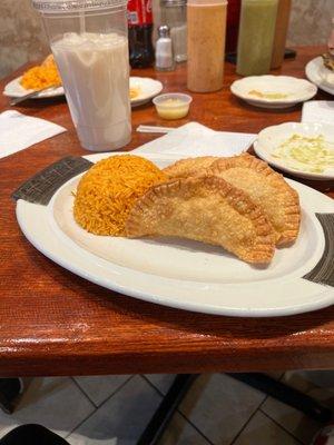 Chicken empanadas and rice
