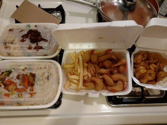 Fried shrimp, fried yellow plantain, shrimp with garlic sauce and general tso chicken combos. Bout to beast out.