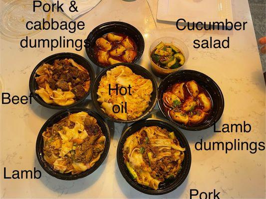 All that we ordered: 4 dishes of hand pulled noodles, 2 dishes of dumplings, and a cucumber salad