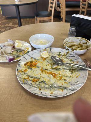 Chicken biryani , saag with house made cheese . . Forgot to take a photo before I ate ..