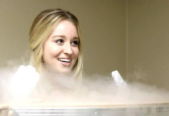 It's cold, but definitely not unbearable. Cassidy is smiling during cryo session; focusing on the end result- feeling refreshed and renewed!