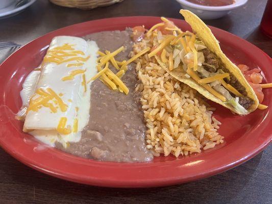 Cheese enchilada with cheese sauce plus a taco