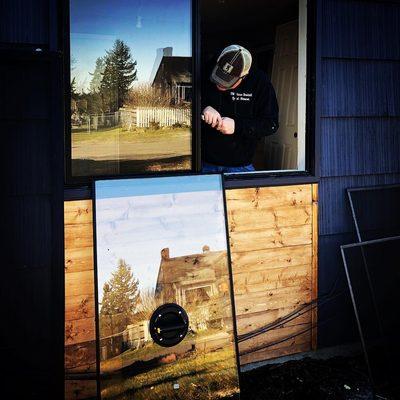 Swapping out insulated glass units for a remodel.