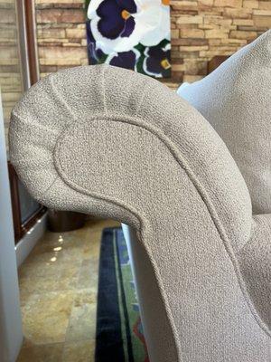 Not round as it was and didn't match either side or other two sofas. And dirt spots.