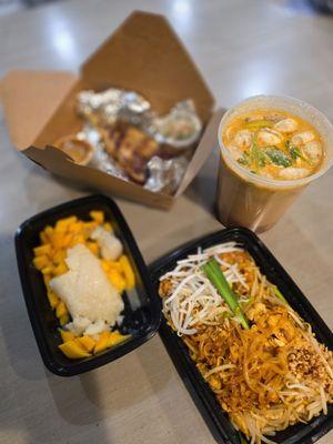 Chicken pad Thai, chicken satay, tom yum and sticky mango rice.