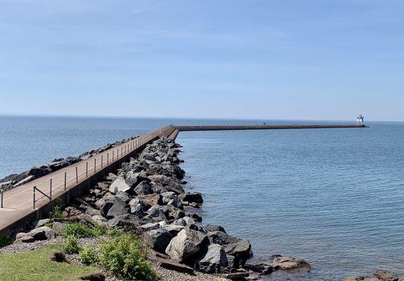 The walking path to the lighthouse is what makes Agate Bay worthwhile.