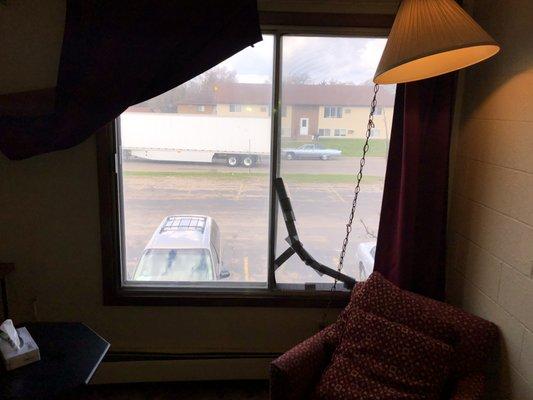 Busted window fixed professionally with duct tapes