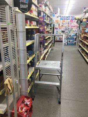 Another step ladder on the sales floor offering another liability to the store.
