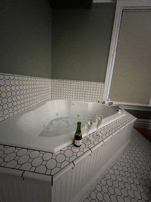 Soaking tub and champagne for two