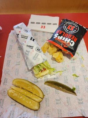 Unwich (lettuce wrapped) chips and a Pickle