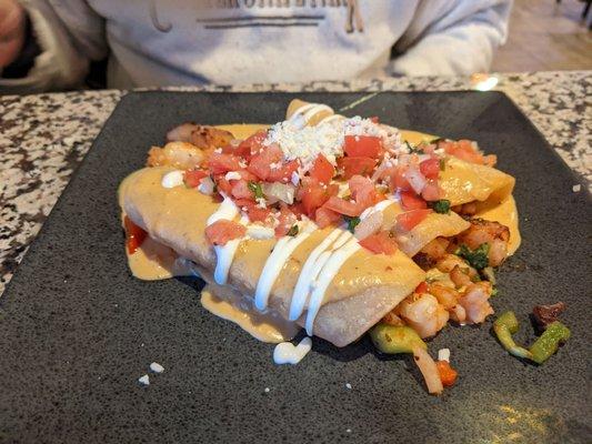 Loaded seafood enchiladas