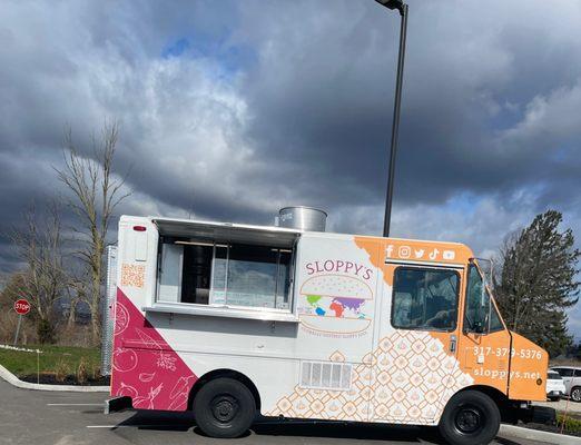 Some food trucks outside