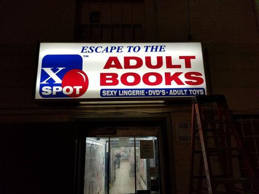 Back parking lot is well lit and this sign is inviting you in to Escape to the XSpot!!!