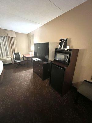 Large TV, Clean Cold Refrigerator, Clean Microwave and Coffee Machine