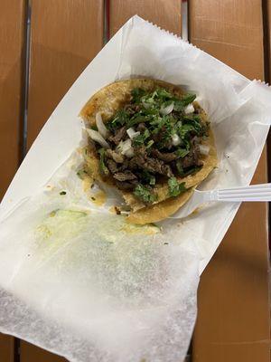 Steak taco (minus a bite)