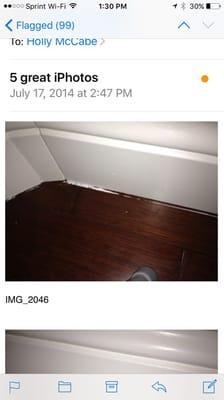 Sloppy workmanship. The painter painted the baseboards after installation and only did one coat of paint, and didn't prime the wood.
