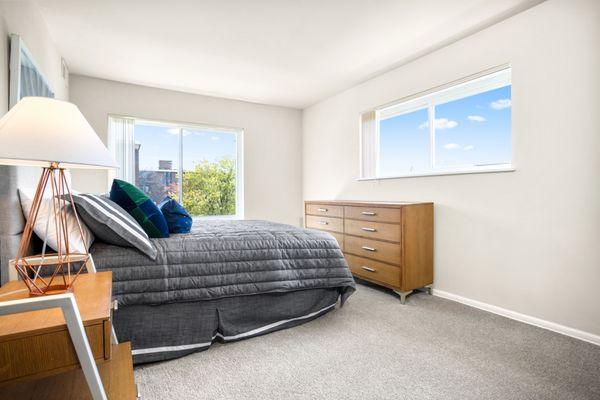 Primary bedroom with walk-in closet