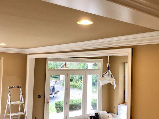 Two-tone high contrast combination - darker ceiling color w/ a lighter trim.