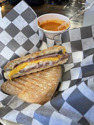 The Longhorn hot beef melt with with homemade tomato bisque soup