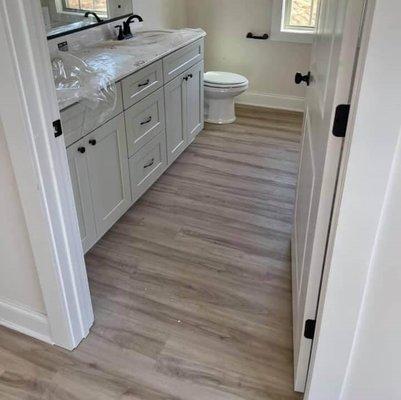Just a picture of the flooring we installed as well as the bathroom Vanity and granite top.