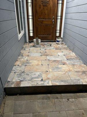 1/3 pattern tile design in front entrance