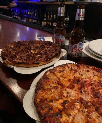 Meat lovers pizza and an onion pizza!
