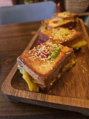 Bombay Toastie- Toasted sandwich with beets, vegetables, and cheese. $15. Very tasty