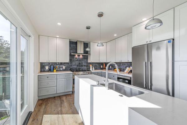 Chef's kitchen with a view, Fisher Paykal appliances and quartz countertops.