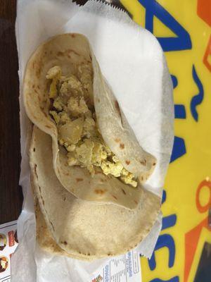 Potato and egg in flour tortilla and chorizo and egg in corn tortilla (tacos)