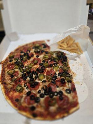 Cheese, Sausage, & Pepperoni, with black olives and jalapeños.