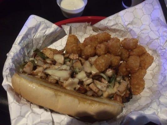 Chicken philly with tater tots.
