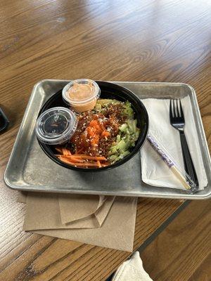 Salmon poke bowl with chili oil and spicy mayo