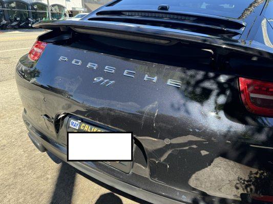 Rear ended - bumper wrecked and spoiler mechanism broken