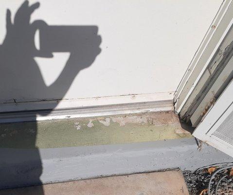 Our HOA hired them to repaint the condos. This is how they left our front doorstep. Half painted.