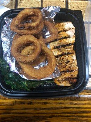 Whiskey glazed salmon, onion rings & spinach