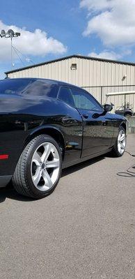 Polishing a black cars not easy